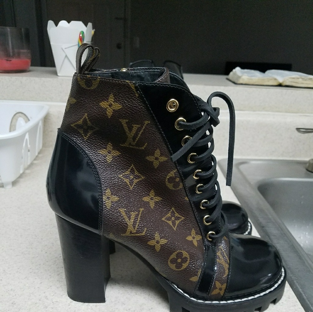 One pair of lightly used louis vuitton star trail